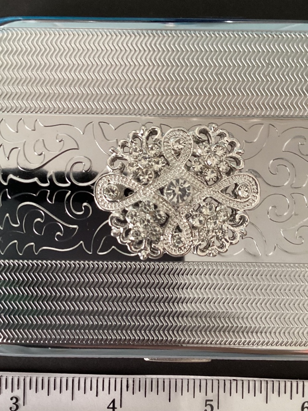 Silver tone hard metal case embellished with dazzling rhinestones….OOAK